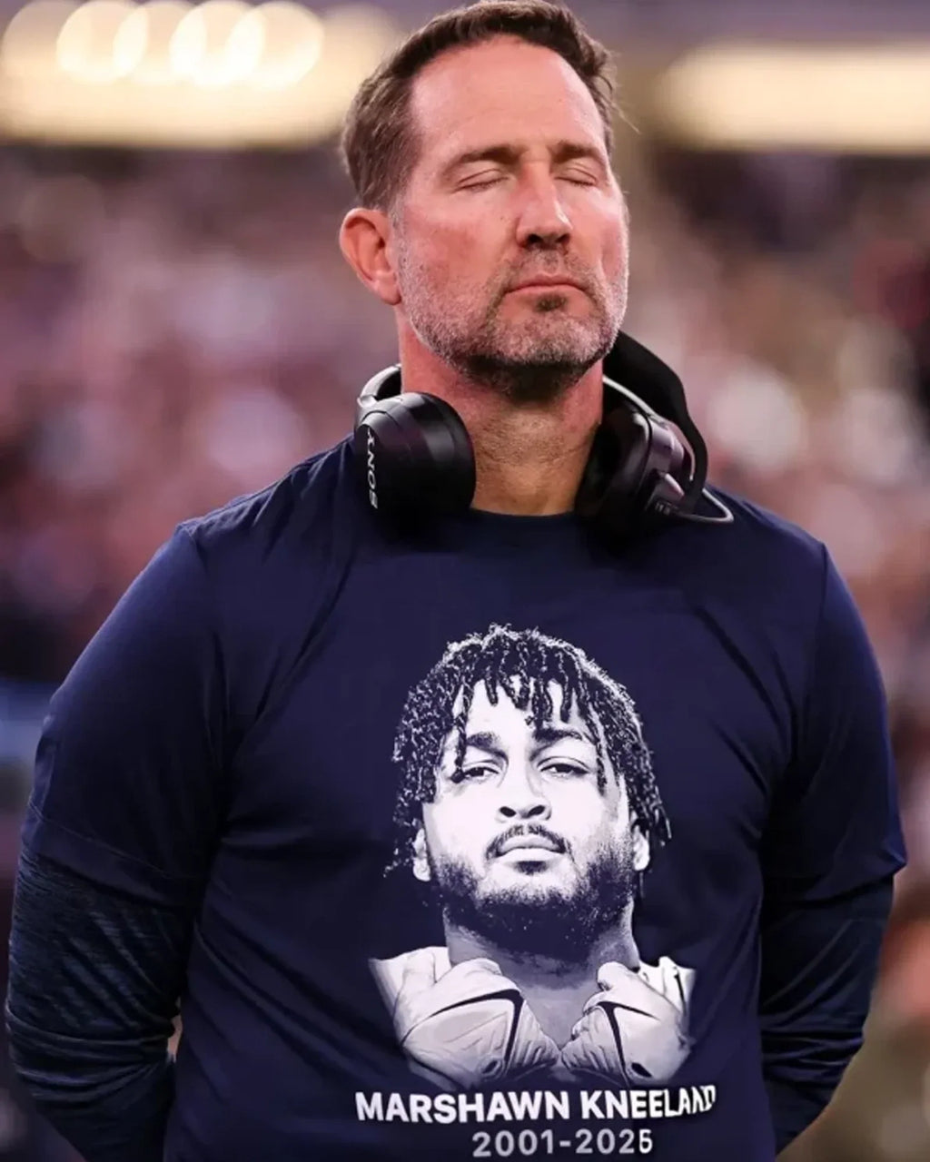 Brian-Schottenheimer-Marshawn-Kneeland-Shirt