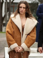 Brown shearling leather jacket Devin Akin The Family S02