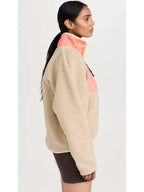 
Wild Vacation Rentals 2026 D’Arcy Carden Pink Fleece Jacket